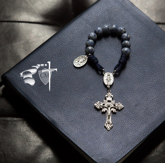 Our Lady of Lourdes St. Bernadette stone pocket rosary, midnight blue cord, Fleur de Lys crucifix, paracord rosary, paracord rosaries, paracord stone rosary, cord rosary, cord rosaries, saint medal, Catholic Milestones, wedding gift, car rosary, auto rosary, men's rosary, groomsmen gift, graduation gift, Holy Orders gift, men's gift, Catholic home decor, Catholic Milestones, Ottawa Ontario, Canada