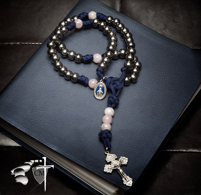 Paracord rosary with rose quartz beads pray to Jesus Christ His only Son our Lord