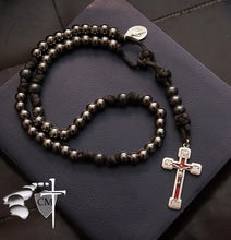 Catholic Milestones; Trinity Rosary; Hematite Our Father accent beads; Miraculous Medal; via Crucis with red enamel; First Communion gift; Confirmation gift; wedding gift; car rosary; auto rosary; men's rosary; groomsmen gift; paracord rosary; graduation gift; Holy Orders gift; Catholic Milestones; Ottawa Ontario; Canada
